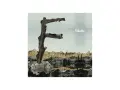 Pochette de l'album "Metals" de Feist, avec une femme allongée sur une branche en forme de F.