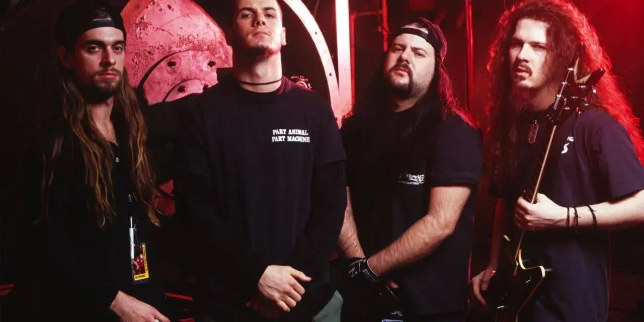 Les membres de Pantera, groupe légendaire, posent pour une photo. Leurs albums ont marqué l'histoire du metal.