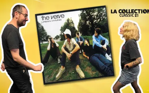 Un homme et une femme admirent la pochette de l'album "Urban Hymns" du chanteur The Verve.