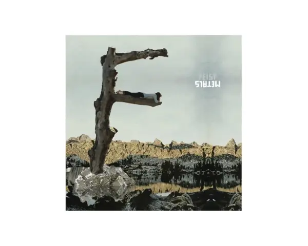 Pochette de l'album "Metals" de Feist, avec une femme allongée sur une branche en forme de F.