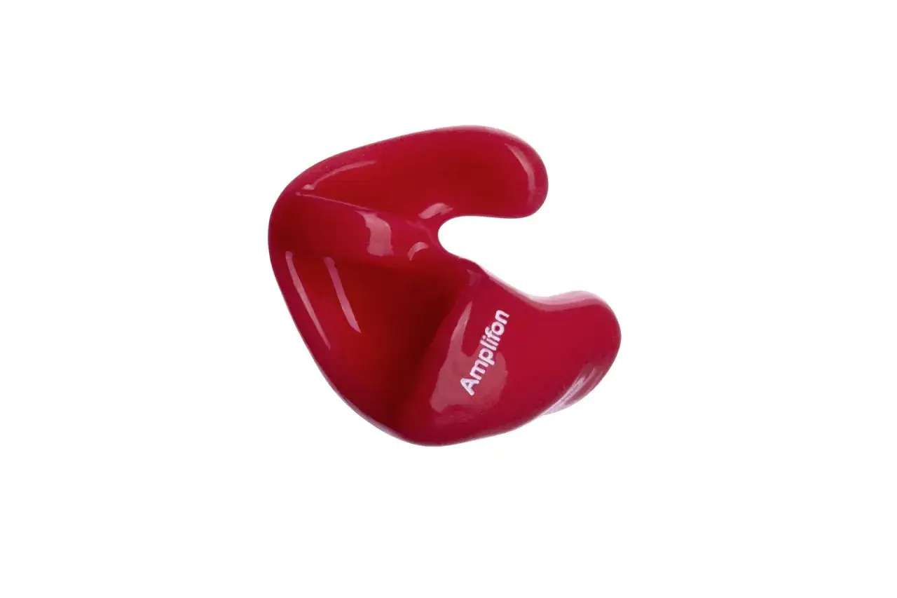 Boule quies rouge Amplifon, utile pour prévenir les otites en protégeant l'oreille.