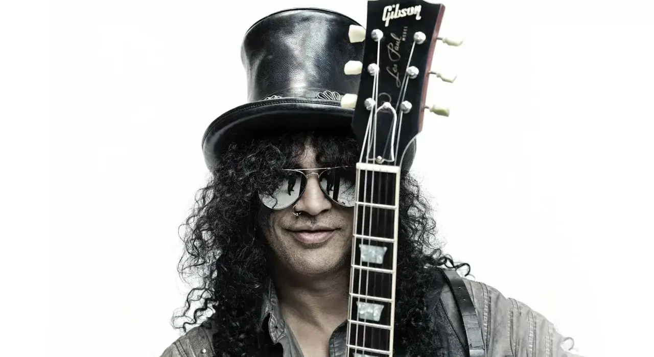 Un guitariste légendaire, un vrai héros de la guitare, avec son chapeau haut-de-forme et sa Gibson Les Paul.
